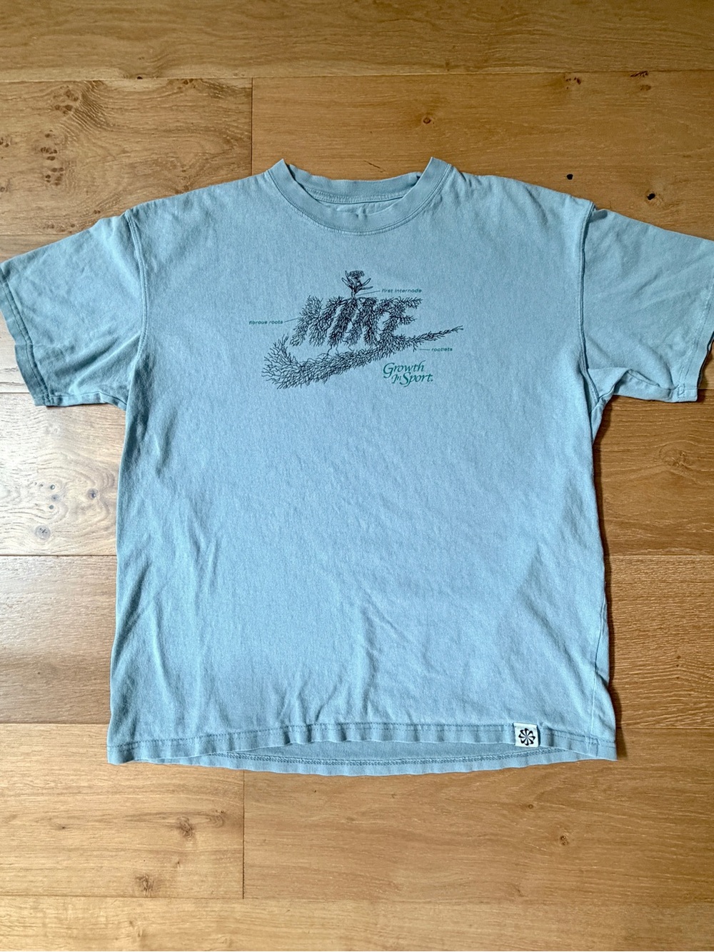 Nike Move To Zero Growth In Sport Root Swoosh Botanical Graphic T-Shirt Large